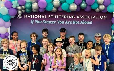 Photo of Mason Massey with youth from the National Stuttering Association