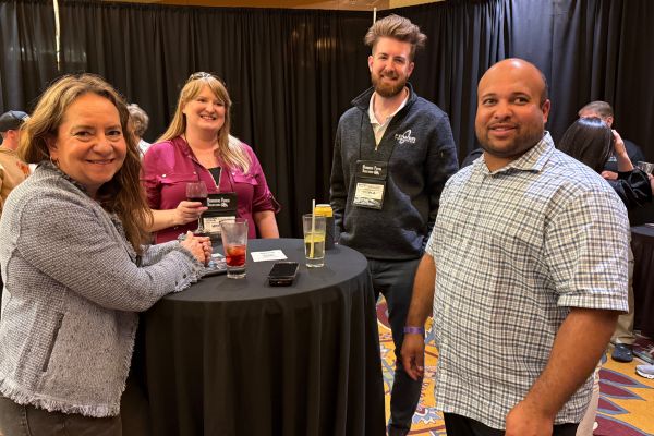 Image of a keynote presenter at a mongoose conference