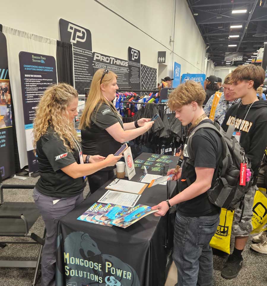 Kim Wall and Michelle Hilger speaking with students at SEMA in 2025